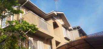 宝塚市築15年スタッコ壁の住宅